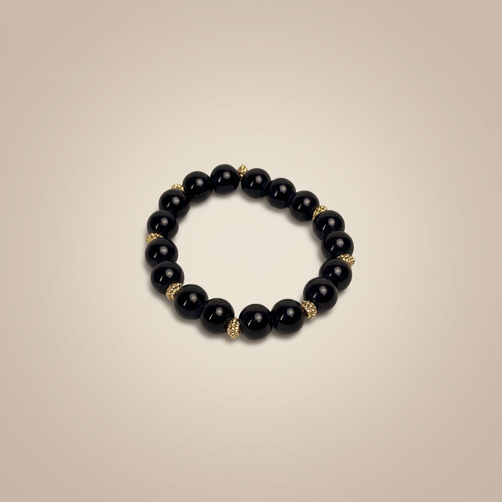 Black Onyx Gold Accent Bracelet - Image 1