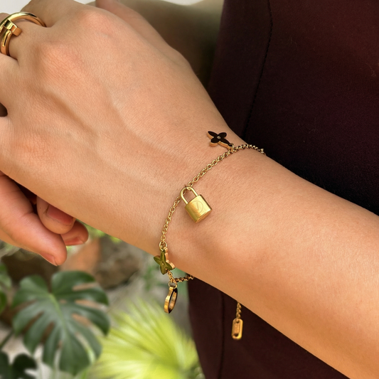 Gold Lock & Flower Charm Bracelet - Image 1