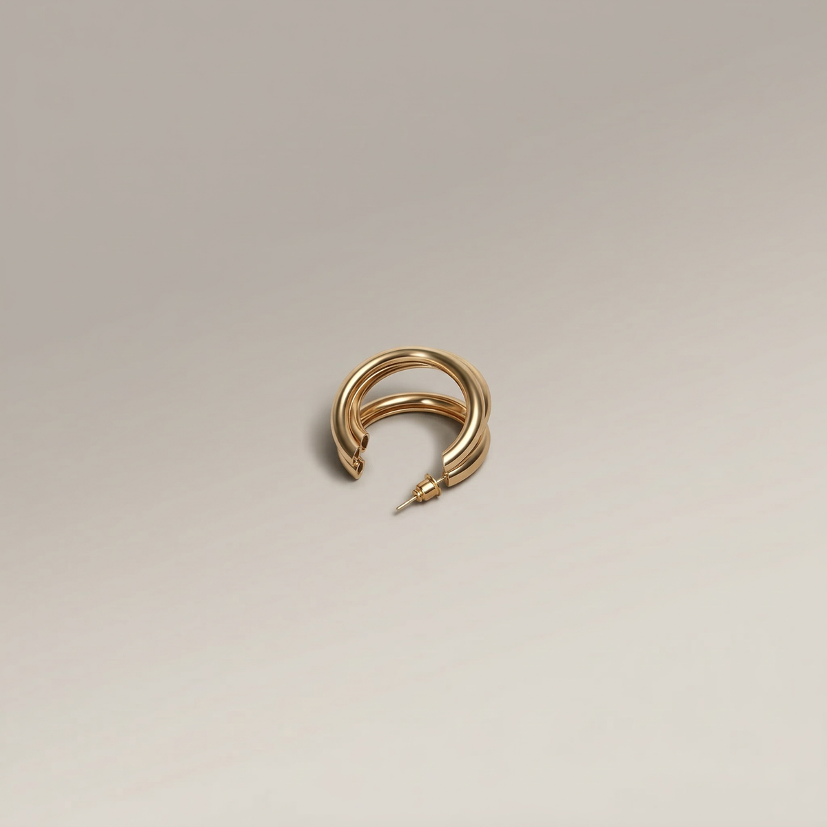 Gold Triple Twist Hoop Earring - Image 1