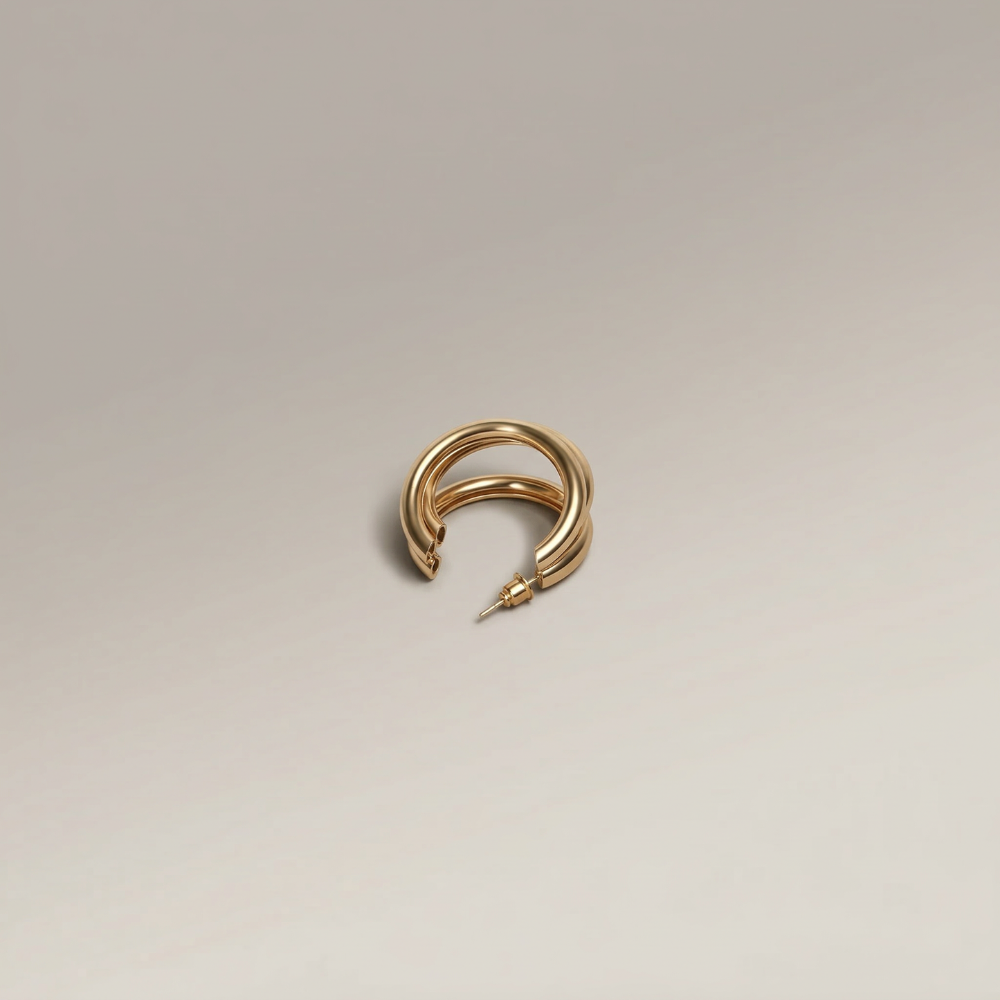 Gold Triple Twist Hoop Earring - Image 1