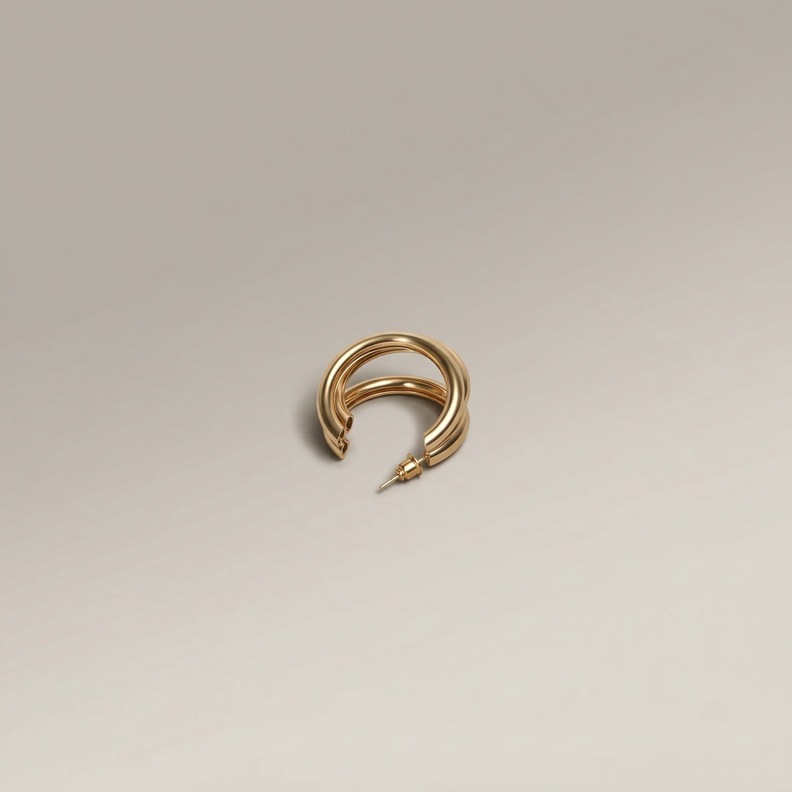 Gold Triple Twist Hoop Earring - Image 1