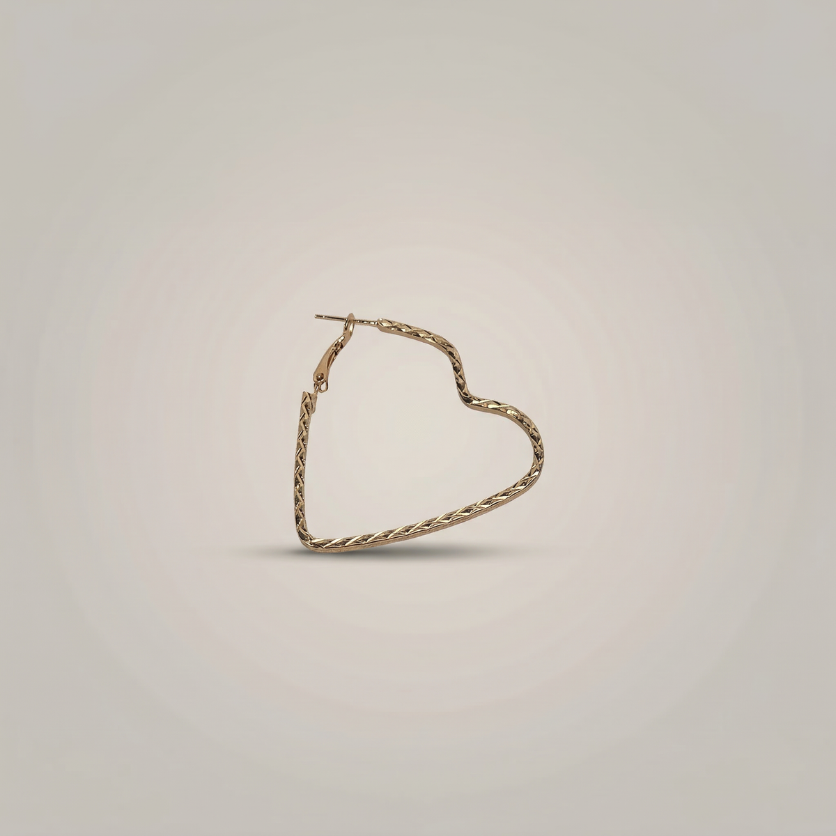 Gold Twisted Heart Hoop Earrings - Image 1