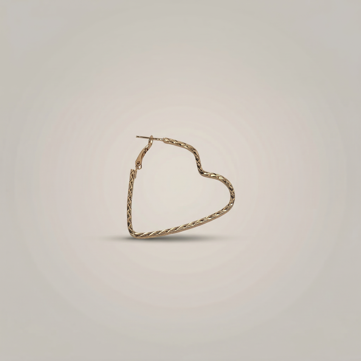 Gold Twisted Heart Hoop Earrings - Image 1