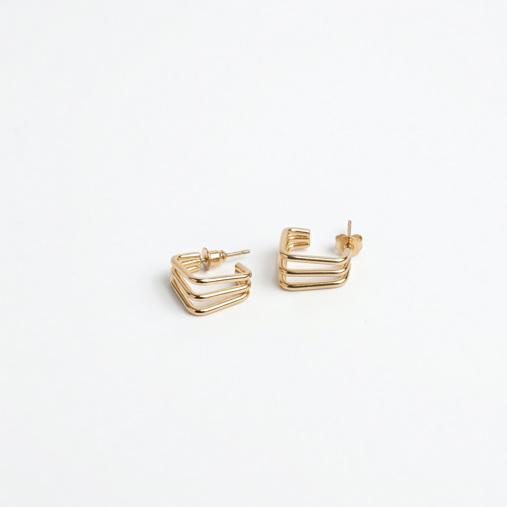 Golden Chevron Stud Earrings - Image 1
