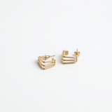 Golden Chevron Stud Earrings - Image 1