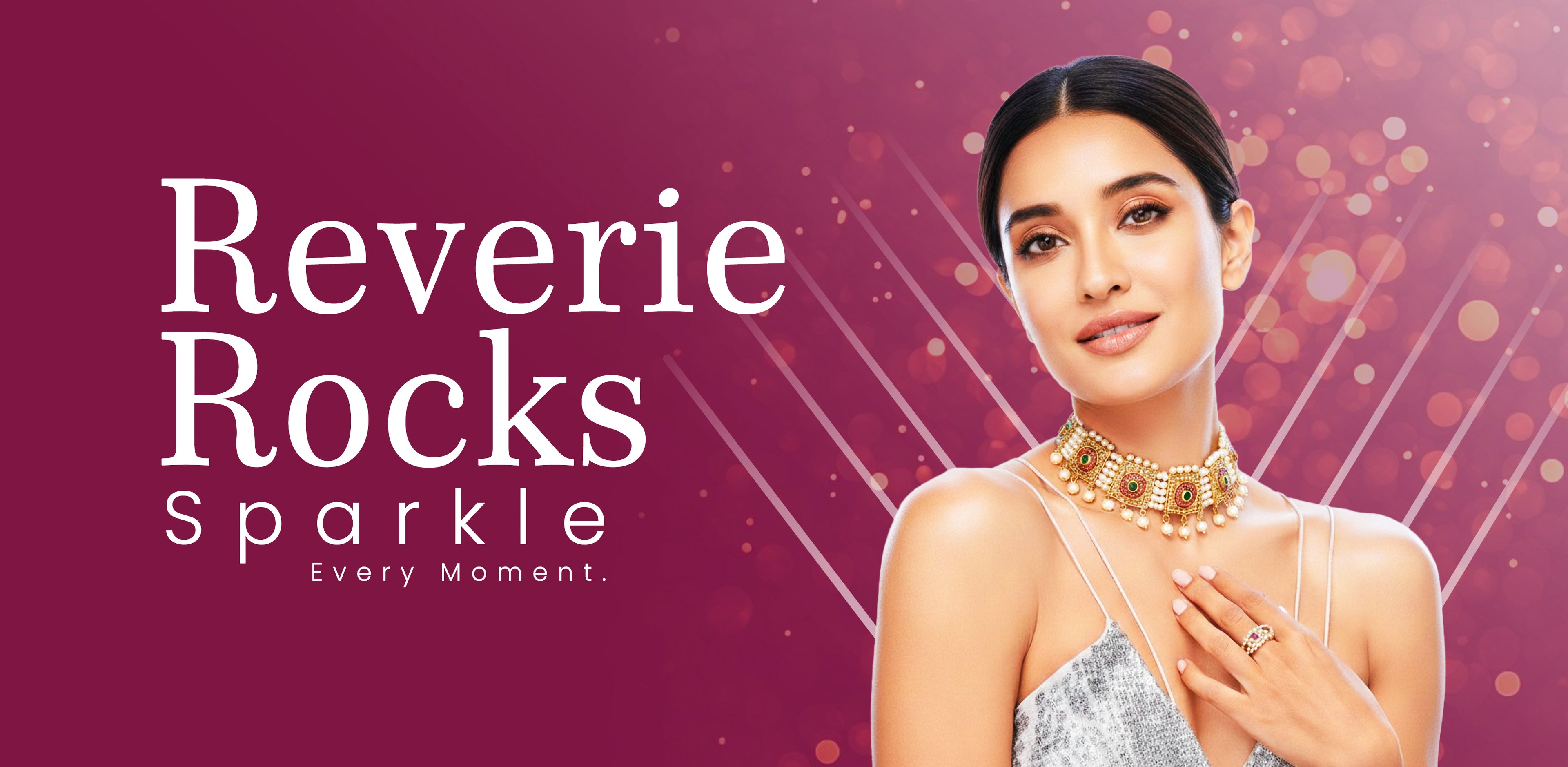 Woman wearing jewelry with 'Reverie Rocks' branding on a purple background